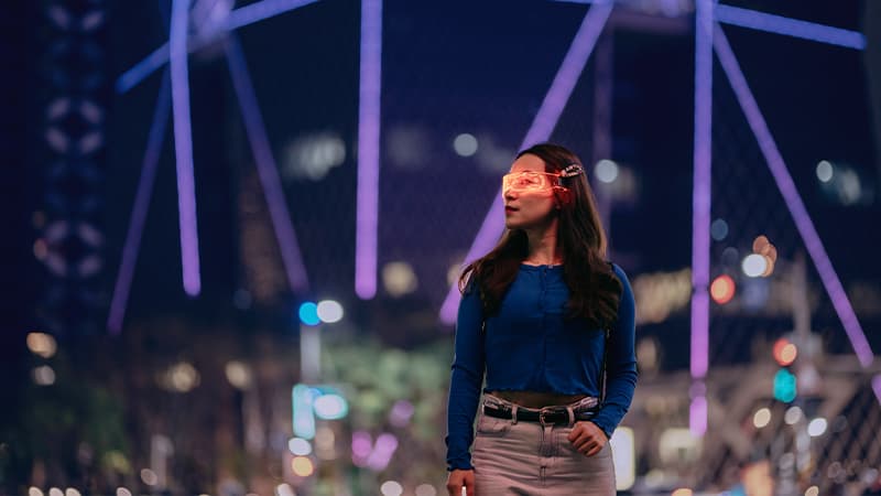 Young Asian Woman Using Smart Glasses